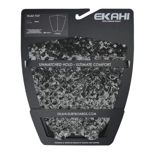 View of a black/grey marble Flat traction surf pad with no arch in the packaging.