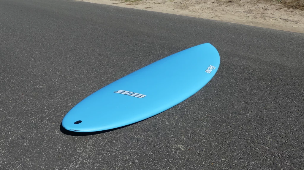 Ekahi 53 Bitume carbon surfboard, blue deck, top deck view