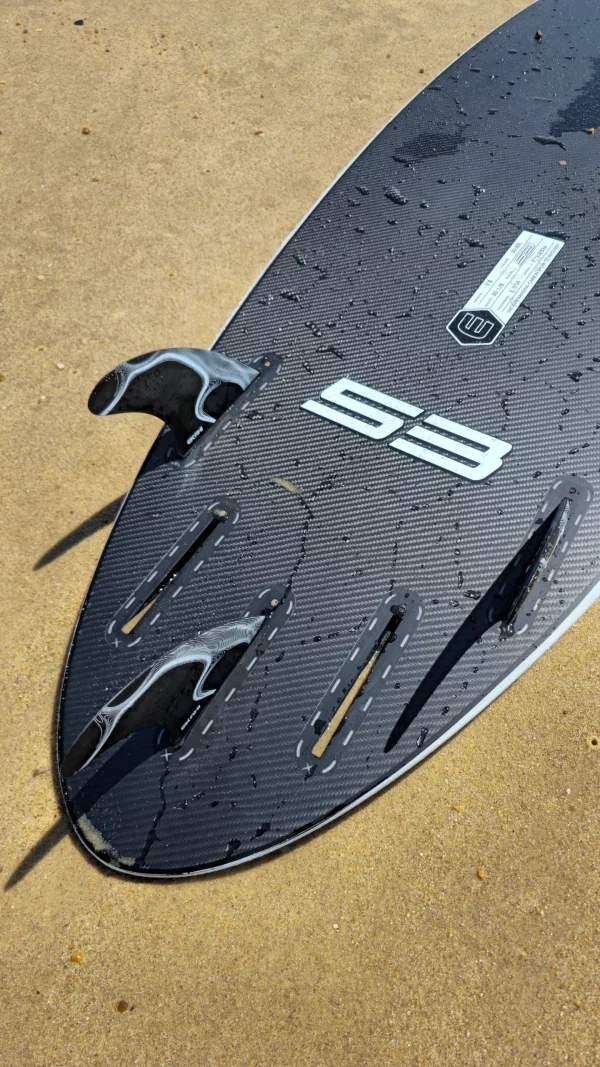 Ekahi 53 carbon surfboard, white deck, bottom view