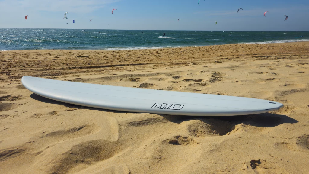 Ekahi Mid21 carbon surfboard, grey deck, top deck view
