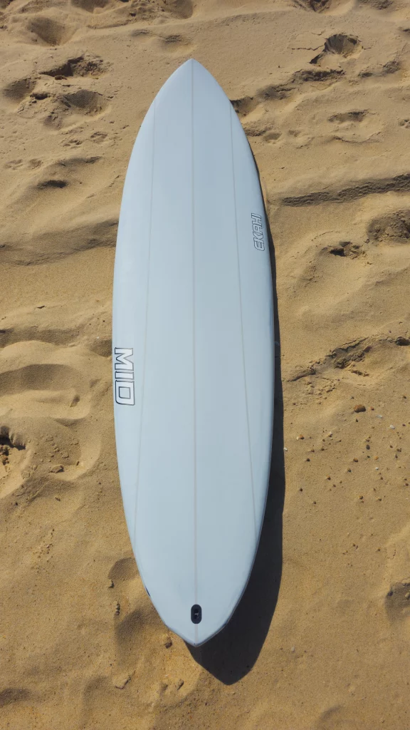 Ekahi Mid21 carbon surfboard, grey deck, top deck view