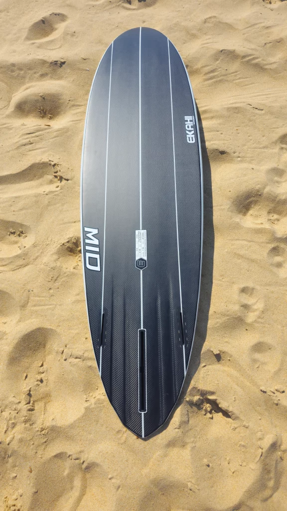 Ekahi Mid21 carbon surfboard, grey deck, bottom view