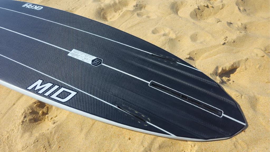 Ekahi Mid21 carbon surfboard, grey deck, bottom view