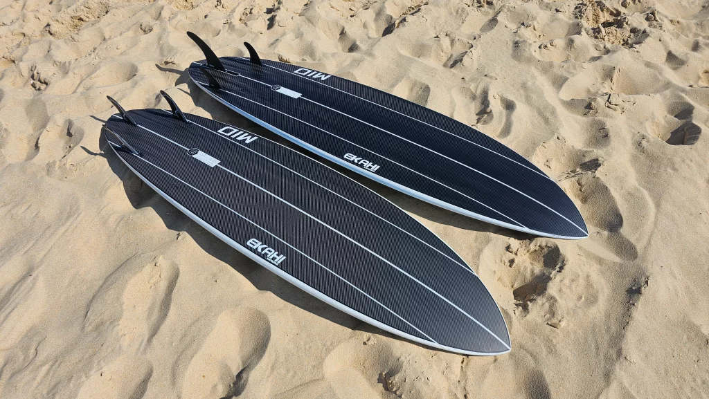 Ekahi Mid21 carbon surfboard, grey deck, bottom view