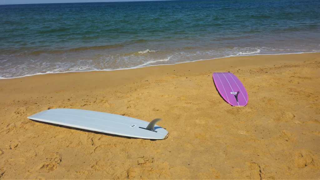 Ekahi Single Pink carbon surfboard, grey deck, bottom view