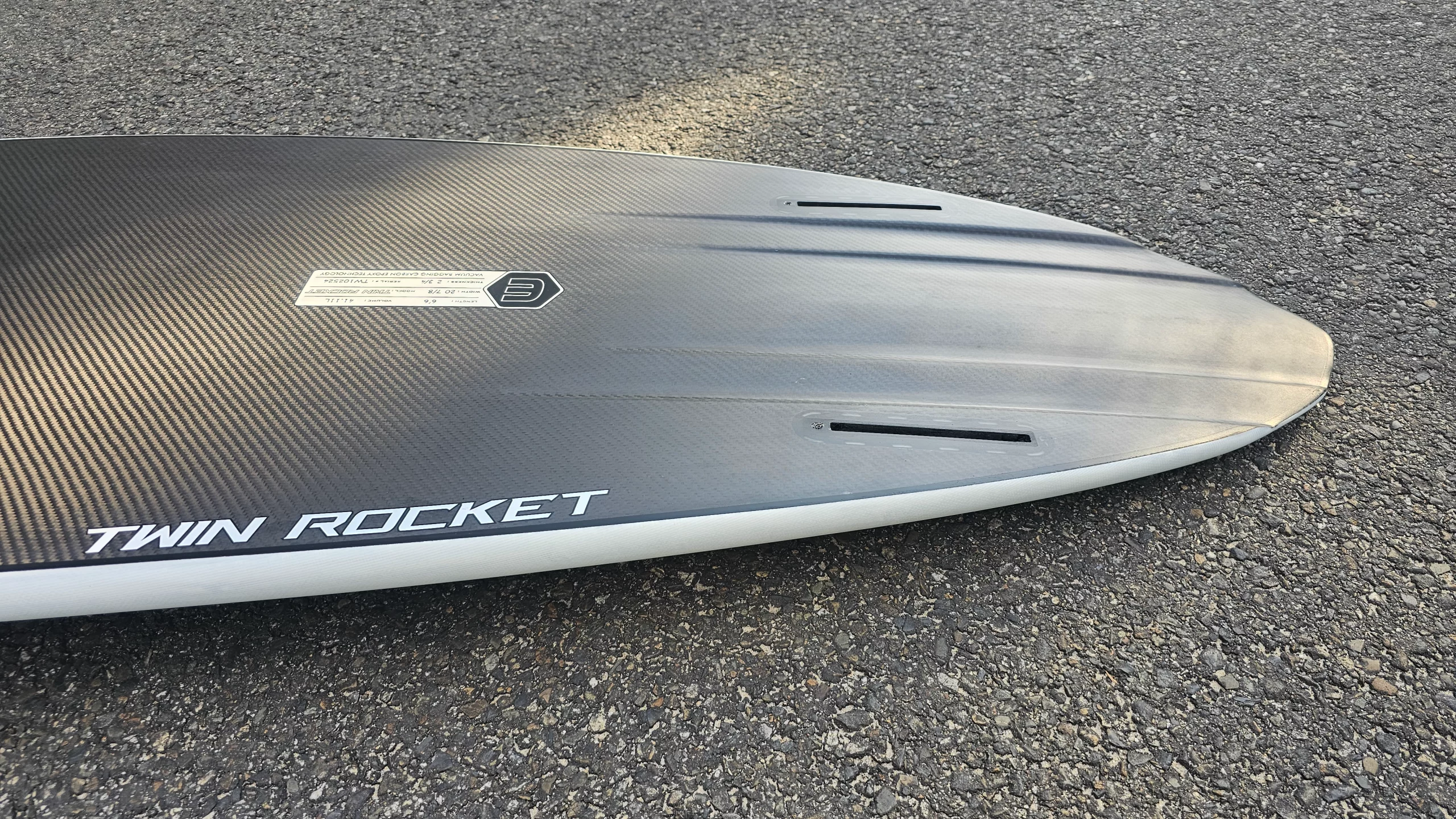 Channels bottom view of the Ekahi Twin Rocket surfboard