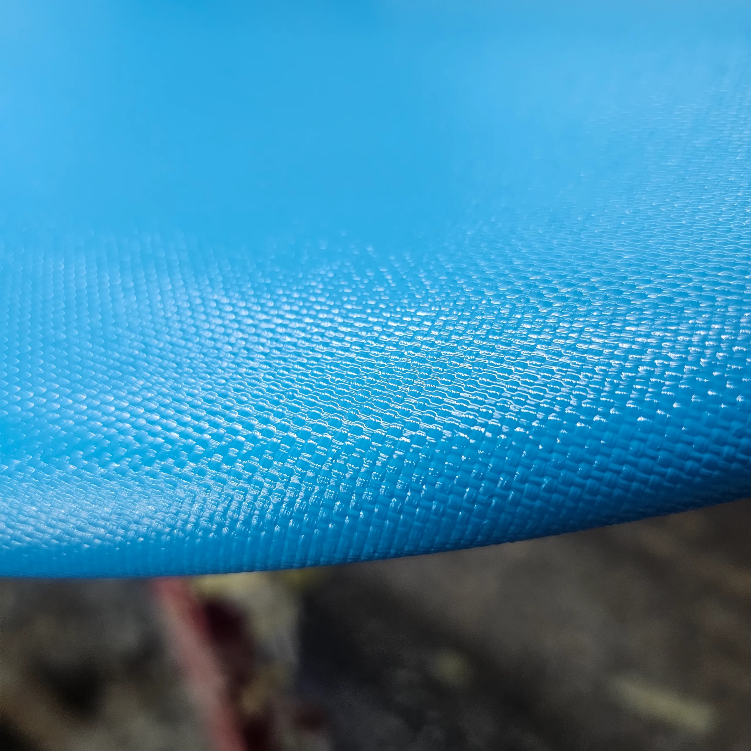 View of the carbon fiber with a blue tinted resin.