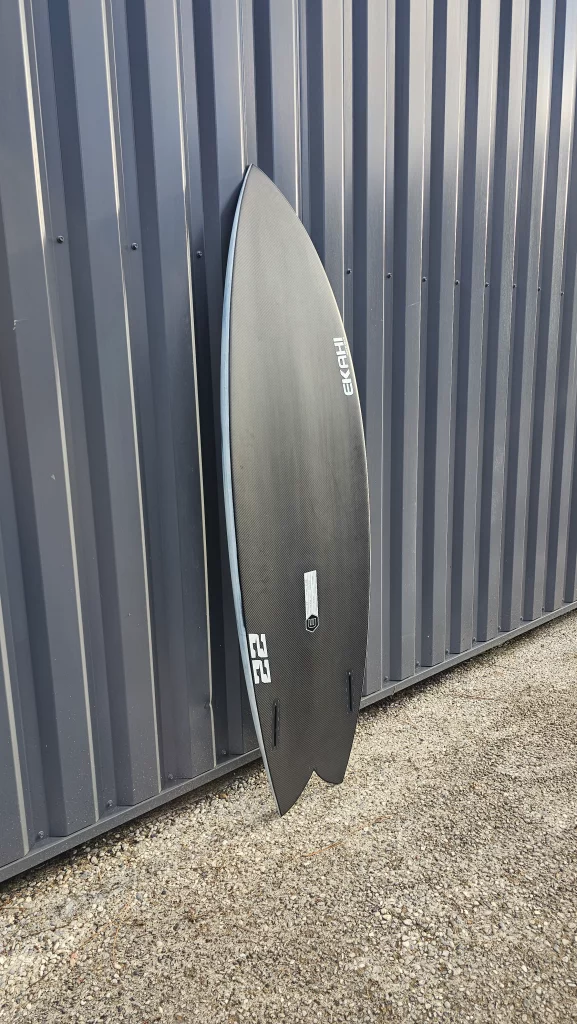 Ekahi 22 carbon surfboard, white deck, bottom view