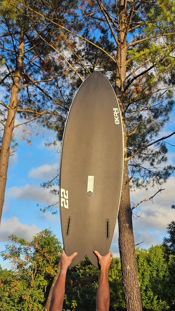 Ekahi 22 carbon surfboard, white deck, bottom view