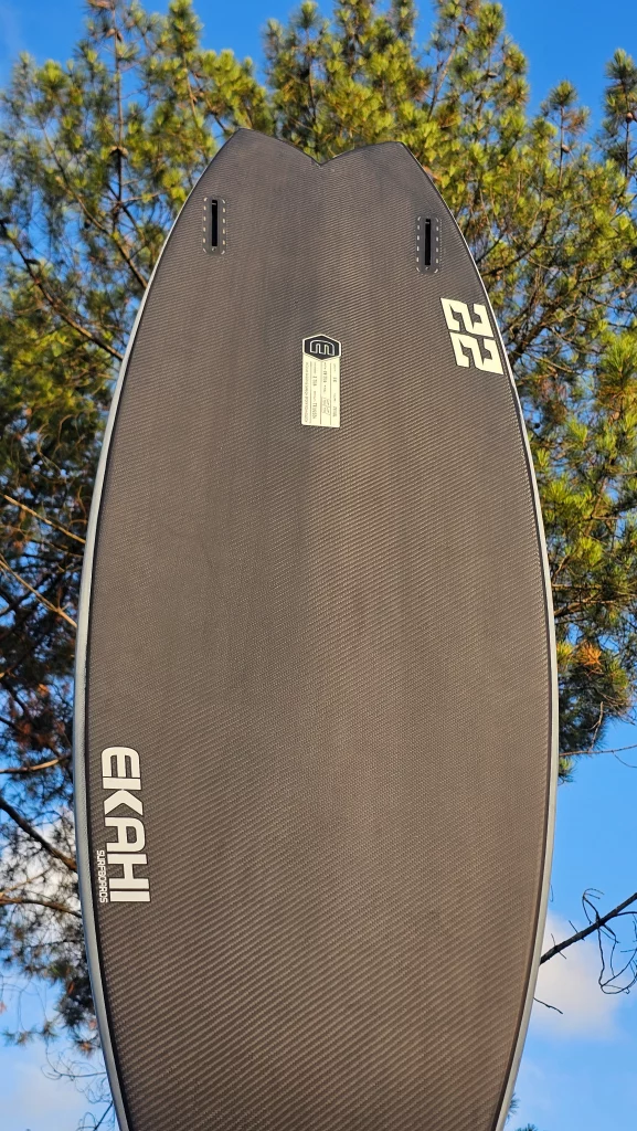 Ekahi 22 carbon surfboard, white deck, bottom view