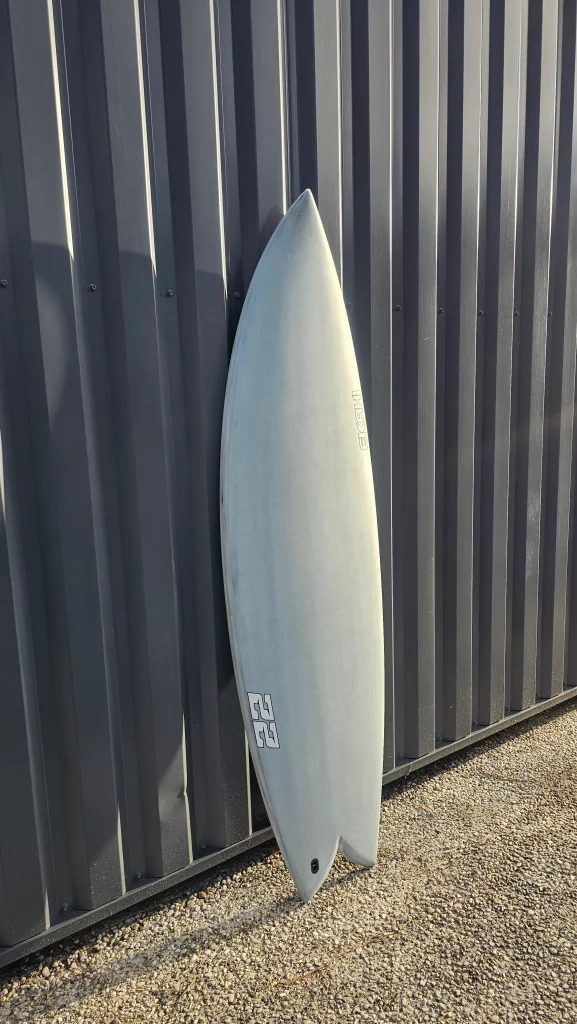 Ekahi 22 carbon surfboard, white deck, top deck view
