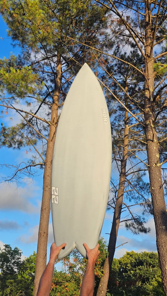 Ekahi 22 carbon surfboard, white deck, top deck view