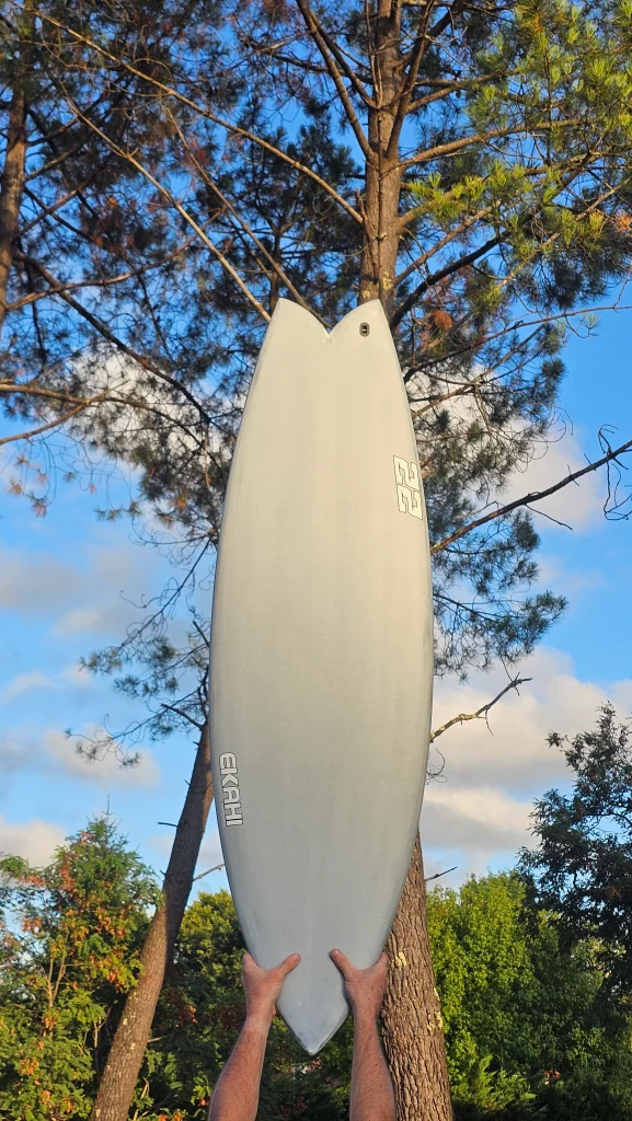 Ekahi 22 carbon surfboard, white deck, top deck view