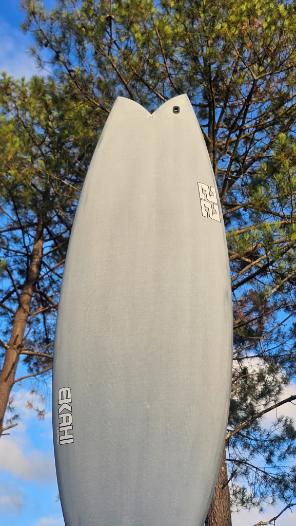 Ekahi 22 carbon surfboard, white deck, top deck view