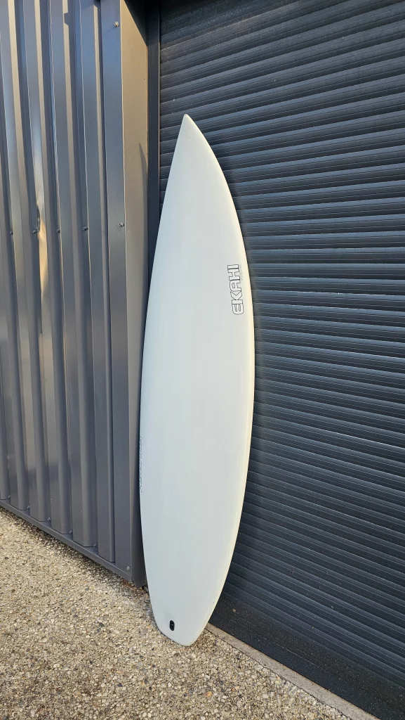Ekahi Squash carbon surfboard, white deck, top deck view