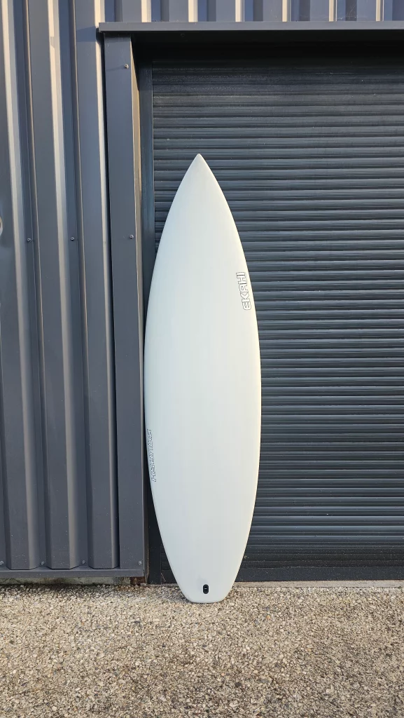 Ekahi Squash carbon surfboard, white deck, top deck view