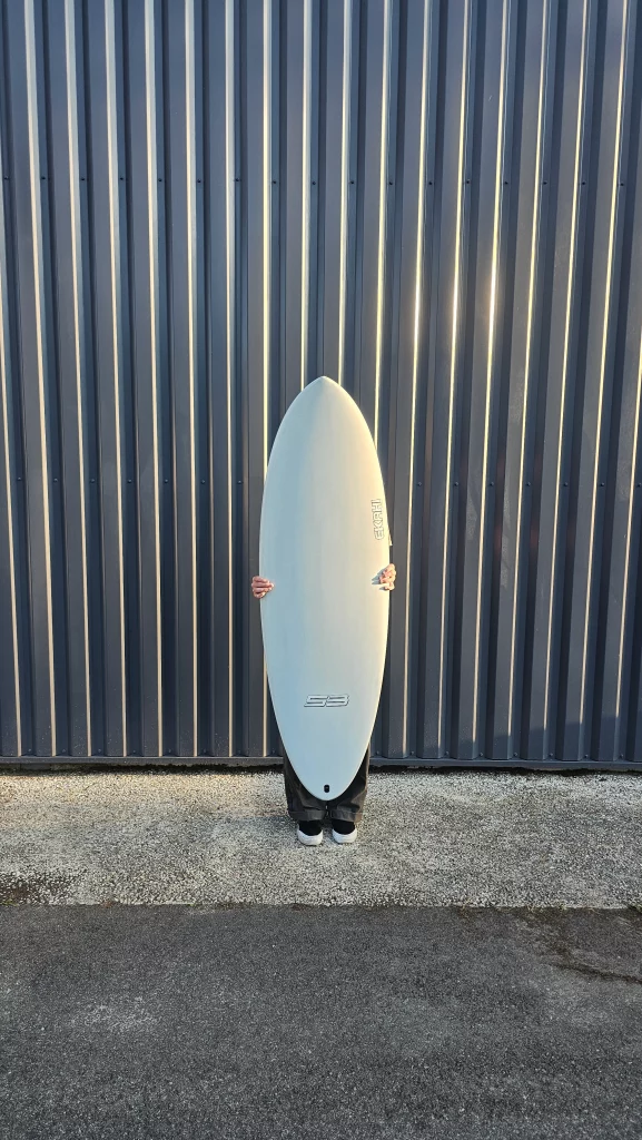 Ekahi 53 carbon surfboard, white deck, top deck view