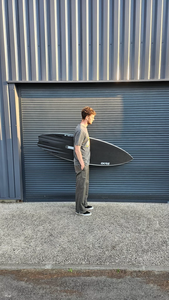 Ekahi Channels carbon surfboard, white deck, bottom view