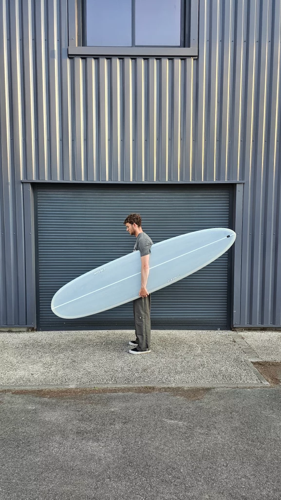Ekahi Long carbon surfboard, grey deck, top deck view