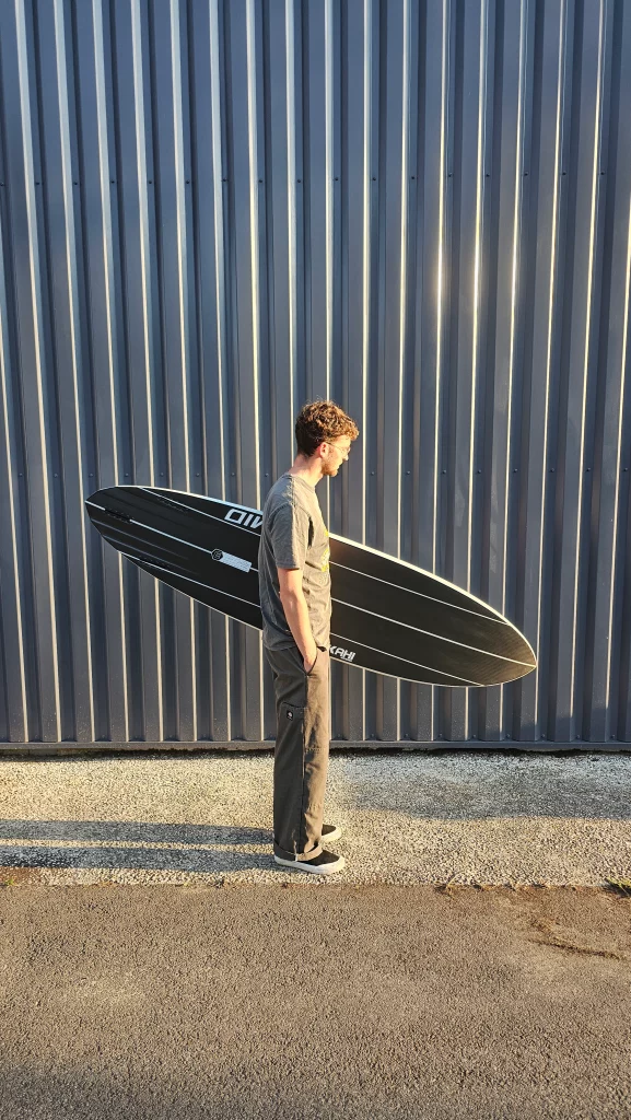 Ekahi Mid carbon surfboard, white deck, bottom view